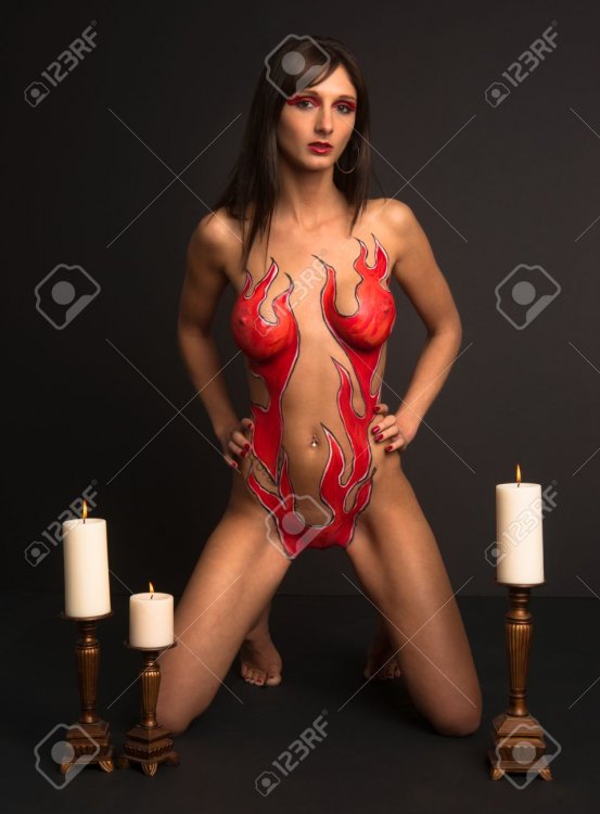 27992786-beautiful-brunette-woman-nude-body-paint-flames-goddess-fire-candles.thumb.jpg.48d500742d0877d5ec1e5463e589fdec.jpg
